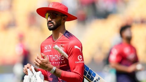 Royal Challengers Bengaluru's Devdutt Padikkal during warm up in Bengaluru.