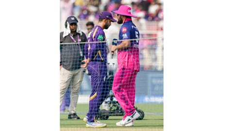 Rajasthan Royals' captain Riyan Parag, right, and Kolkata Knight Riders' captain Ajinkya Rahane at toss during the Indian Premier League (IPL) 2026 T20 cricket match between Kolkata Knight Riders and Rajasthan Royals, at Eden Gardens in Kolkata, West Bengal, Sunday, April 19, 2026 
