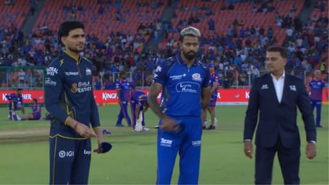 GT skipper Shubman Gill tosses the coin. 