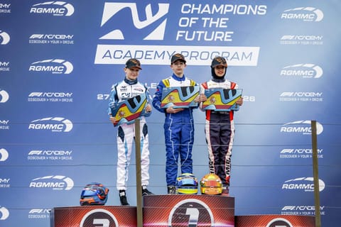 Indian racer Atiqa Mir, right, poses on the podium after finishing third in the final of Round 1 of the Champions of the Future Academy karting series at the Lucas Guerrero Circuit, in Valencia, Spain. Atiqa Mir became the first Indian to secure a podium finish in the European leg of the series.