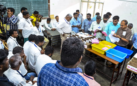 Puducherry: Poll officials during the counting of votes for the Puducherry Assembly elections at a counting centre, in Puducherry, Monday, May 4, 2026.
