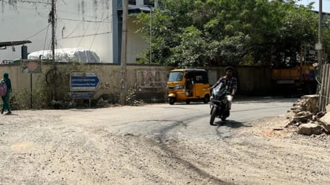 Uneven and dusty road in the Madhavaram Milk Colony