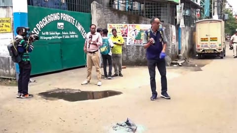 Forensic team officials investigating the crime scene following the killing of BJP leader Suvendu Adhikari's close aide Chandranath Rath