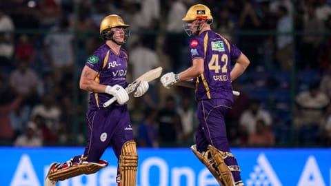  Kolkata Knight Riders' Finn Allen, left, and Cameron Green run between the wickets during an Indian Premier League (IPL) 2026