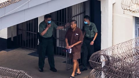 Jimmy Lai walks through the Stanley prison in Hong Kong, on July 28, 2023.