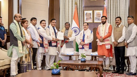 Assam Chief Minister-designate Himanta Biswa Sarma meets Governor Lakshman Prasad Acharya and stakes claim to form the next government, in Guwahati, Assam. Union Minister JP Nadda, Haryana Chief Minister Nayab Singh Saini, state BJP president Dilip Saikia, and others, are also seen 