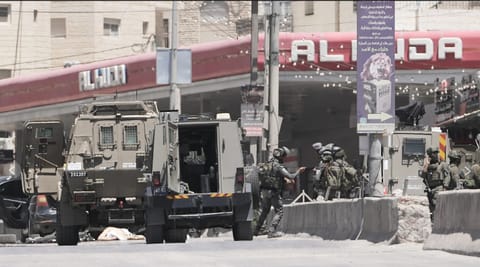 Israeli border police officers operate in the West Bank refugee camp of Qalandia, after Israeli forces shot and killed a suspected militant who opened fire on troops, Monday, May 11, 2026.