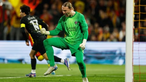 PSG's goalkeeper Matvey Safonov reacts after making a save during the French League One soccer match between Lens and Paris Saint Germain, in Lens, northern France, Wednesday, May 13, 2026.
