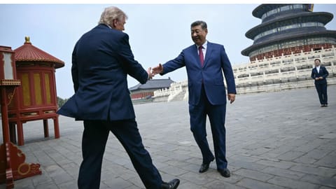China’s President Xi Jinping, right, and U.S. President Donald Trump shake hands at the Temple of Heaven in Beijing Thursday, May 14, 2026.