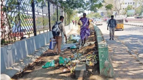 Pedestrians walking at Dr Guruswamy Bridge in Chetpet
