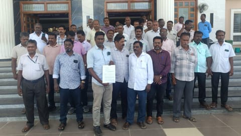 Members of Tasmac Employees' Union outside the Mayiladuthurai Collectorate after submitting a petition