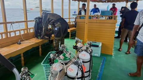 A Finnish diver gets ready to attempt to recover the bodies of two of the four Italians who died deep inside an underwater cave in an atoll earlier this month, at Alimathaa Island, in Vaavu Atoll, Maldives