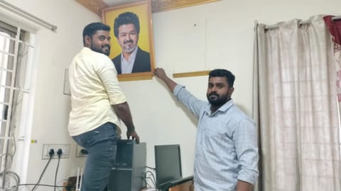CM Vijay's photos placed in govt offices