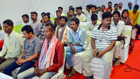 Family members of 27 Maoists attend an event after their surrender, in Ranchi, Jharkhand, Thursday, May 21, 2026 
