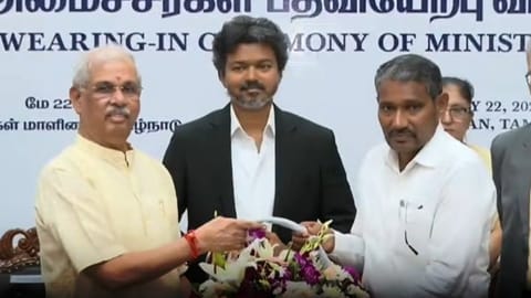 Governor Rajendra Vishwanath Arlekar administers oath to Vanni Arasu in presence of CM Vijay