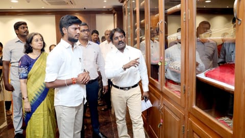 HR&CE Minister S Ramesh inspecting the palm leaf manuscript centre managed by the department

