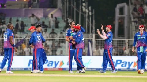 Delhi Capitals' captain Axar Patel, centre, and teammates celebrate after team's win in the Indian Premier League (IPL) 2026 T20 cricket match between Kolkata Knight Riders and Delhi Capitals