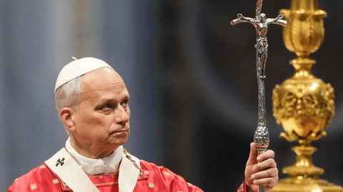 Pope Leo XIV holds the pastoral staff as he celebrates the Pentecost Mass in St. Peter’s Basilica, at the Vatican.