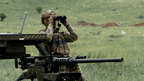 A Ukrainian serviceman of the Cerberus Ground Unmanned Systems Company of the 60th Separate Mechanized Brigade, Third Army Corps, conducts a drill with a combat ground drone during a training at the polygon in Kharkiv region, Ukraine, Sunday, May 24, 2026.
