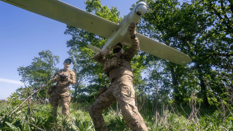 Ukrainian servicemen of Khartia brigade launch a drone towards Russian positions at the front line in the Kharkiv region, Ukraine, Wednesday, May 20, 2026.