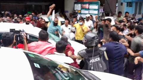 LDF activists attack the vehicle carrying Enforcement Directorate (ED) officials after ED conducted a raid at former Kerala Chief Minister Pinarayi Vijayan's residence as part of its investigation in the CMRL money laundering case