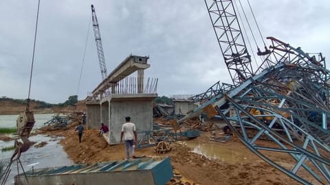Officials present at the site after part of an under-construction bridge collapsed following a storm over the Betwa river, leaving six labourers dead and three others injured, in Hamirpur district, Uttar Pradesh, early Friday, May 29, 2026
