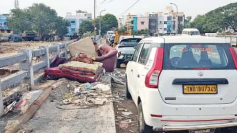 Household waste dumped on pedestrian walkway of West Namasivaya Bridge across Cooum