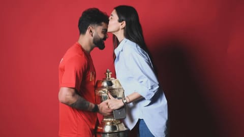 Anushka Sharma celebrates with husband Virat Kohli.
