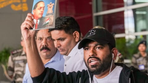 New Delhi: Cockroach Janta Party (CJP) founder Abhijeet Dipke holds a copy of the autobiography of Dr. BR Ambedkar as he arrives at the Indira Gandhi International (IGI) Airport, in New Delhi, Saturday, June 6, 2026. Dipke, founder of the online movement CJP, arrived in Delhi on Saturday ahead of a planned demonstration at Jantar Mantar, and urged supporters to maintain discipline and ensure that the protest remains peaceful.