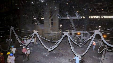 Officials inspect the accident site at the Rashtriya Ispat Nigam Ltd (Vizag Steel Plant)
