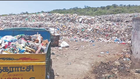 Municipal garbage disposal site located near the Pachaiamman Temple along the Chennai-Tiruchy National Highway