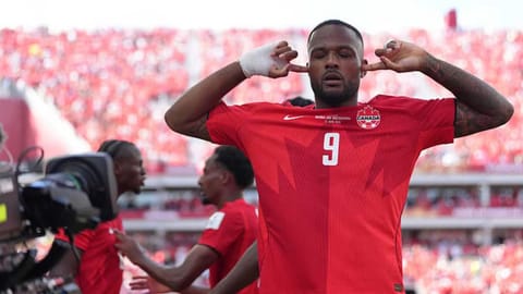 Canada's Cyle Larin (9) celebrates after scoring his sides first goal of the game in the second half of the World Cup Group B soccer match between Canada and Bosnia, Toronto.