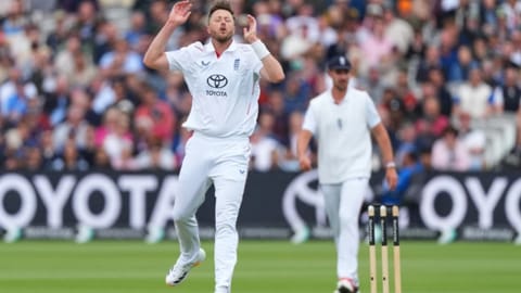 England’s Ollie Robinson reacts after bowling a delivery during the fourth day of the Test match between England and New Zealand at Lord’s cricket ground in Londo