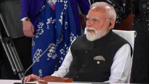 Prime Minister Narendra Modi attends a working session at the G7 Summit, in Evian-les-Bains