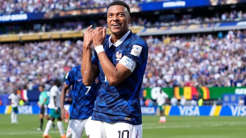 France's Kyilan Mbappe celebrates after scoring the opening goal for his team in World cup soccer match