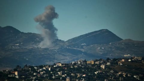 Smoke rises to the sky following an Israeli military strike in southern Lebanon as seen from northern Israel