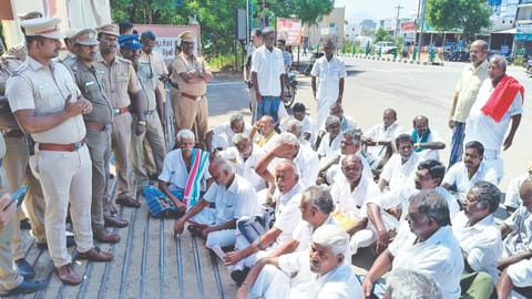 Farmers protest seeking entry for all members of the association to raise issues at the grievance meeting in Theni on Friday 