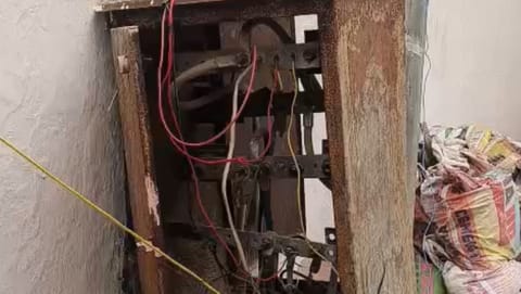 Household cables directly connected to pillar box on Third Street, Old Venkatapuram, Kannikapuram