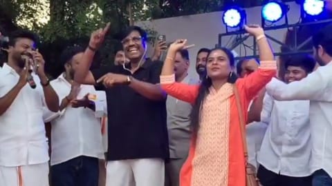 Screengrab of the Higher Education Minister dancing at an event in a school in Melur 