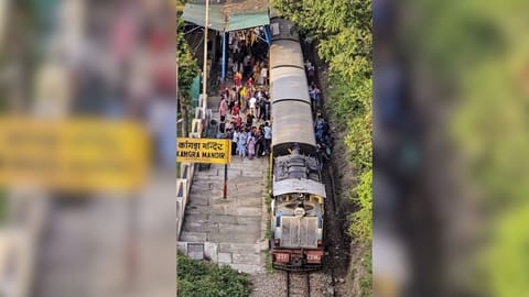 Passengers travelling in an overcrowded train in Himachal Pradesh.
