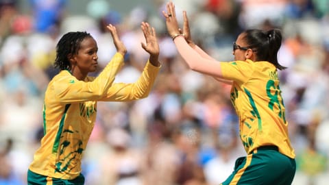 South Africa's Ayabonga Khaka (left) celebrates taking the wicket of India's Yastika Bhatia during the ICC Women's T20 World Cup match between India and South Africa, at Emirates Old Trafford, Manchester, England, Sunday June 21, 2026 