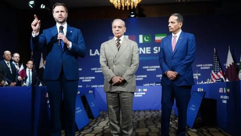 US Vice President JD Vance, left, makes an opening statement next to Pakistan's Prime Minister Shehbaz Sharif, center, and Qatar's Prime Minister and Minister for Foreign Affairs Sheikh Mohammed bin Abdulrahman bin Jassim Al-Thani, at the Bürgenstock Resort in Obbuergen, Switzerland