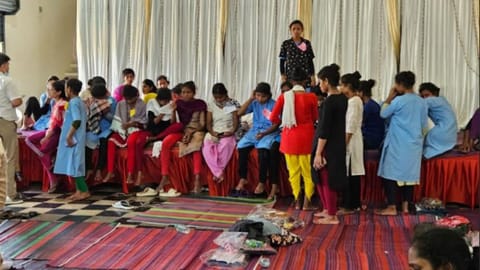 Women survivors sheltered at a private marriage hall in Periyapalayam are provided medical support
