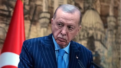 Turkey’s President Recep Tayyip Erdogan listens as Somalia’s President Hassan Sheikh Mohamud speaks during a joint news conference in Istanbul, Turkey