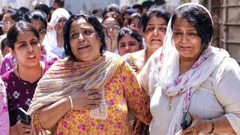Family members mourn the death of Sanyam Vijj, a victim of the Lucknow coaching centre fire, in Kanpur