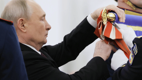 Russian President Vladimir Putin attends a ceremony to present the Order of Zhukov to the Presidential Regiment of the Russian Federal Guard Service at the Kremlin's St. George Hall in Moscow, Tuesday, June 23, 2026. (Mikhail Metzel/Sputnik, Kremlin Pool Photo via AP)