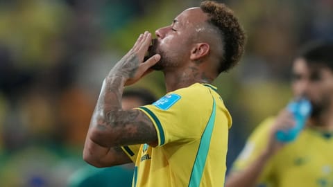 Brazil's Neymar (10) celebrates after the World Cup Group C soccer match between Scotland and Brazil in Miami Gardens