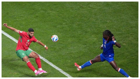 Morocco's Ismael Saibari (11) kicks the ball past Haiti's Ricardo Ade (4) during the World Cup Group C soccer match between Morocco and Haiti in Atlanta.