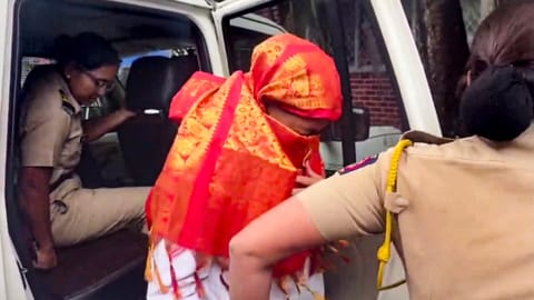 Police personnel escort accused Siya to the Lonavala Gramin Police Station for questioning in connection with the Ketan Agarwal death case