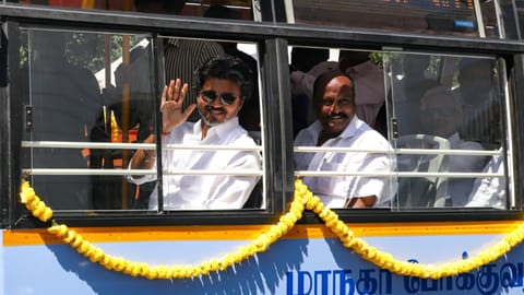 CM Vijay travelling in one of the newly launched buses